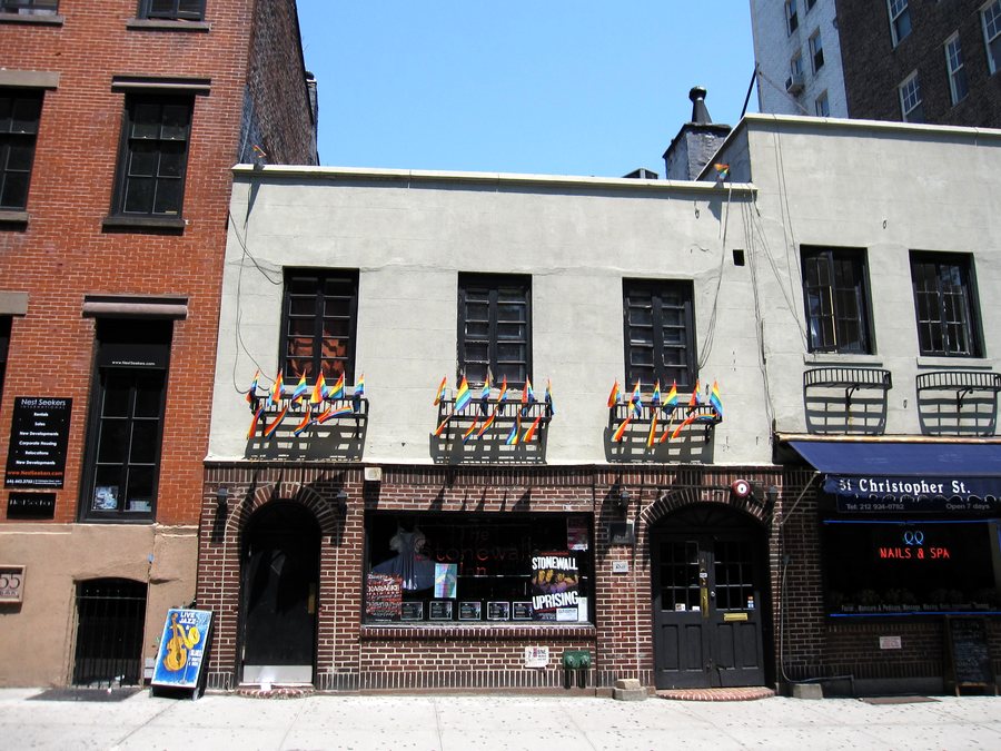 The same two buildings in 2010, the Stonewall Inn, with window boxes along the upper floor.