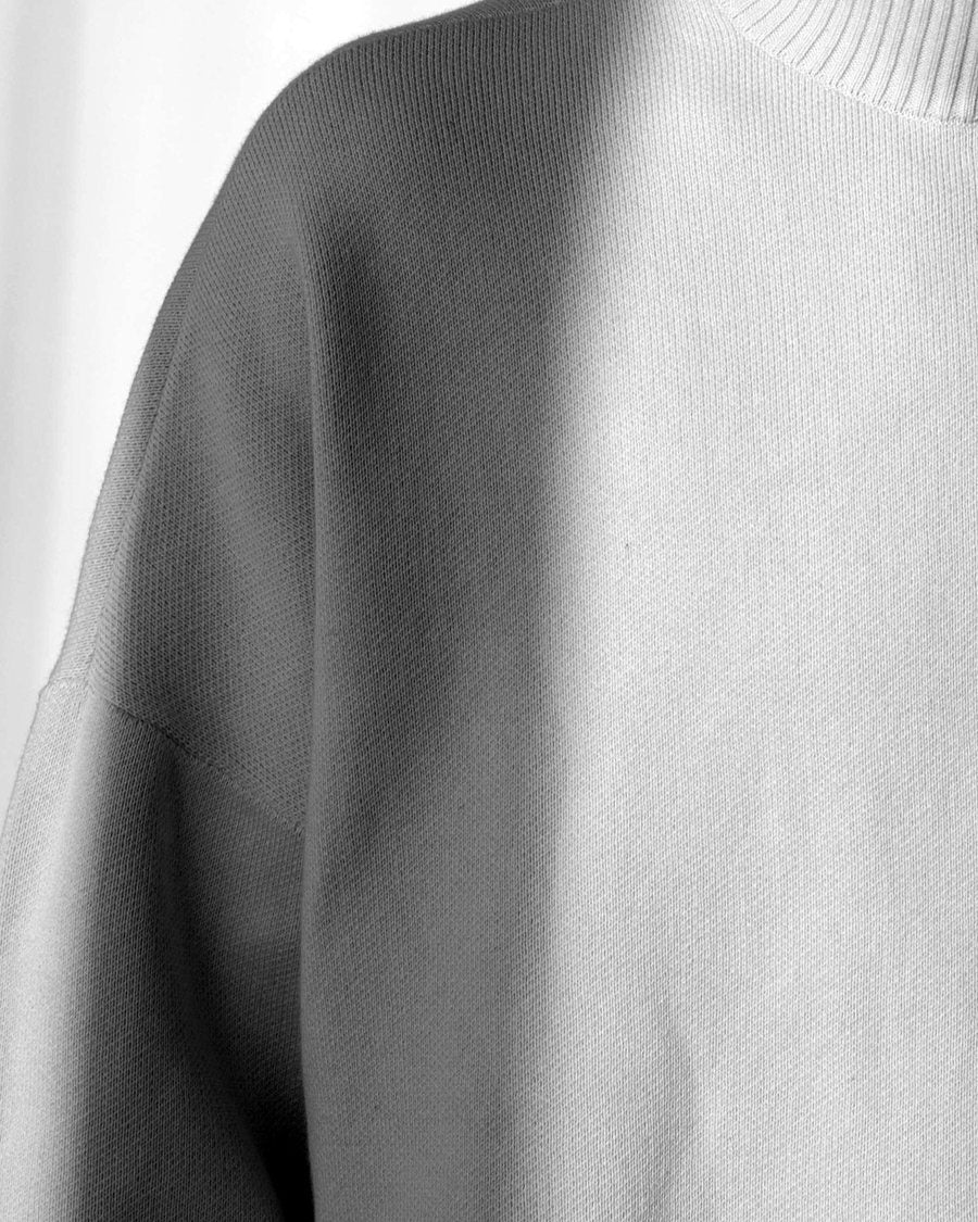 The cream shoulder, a shadow across it
